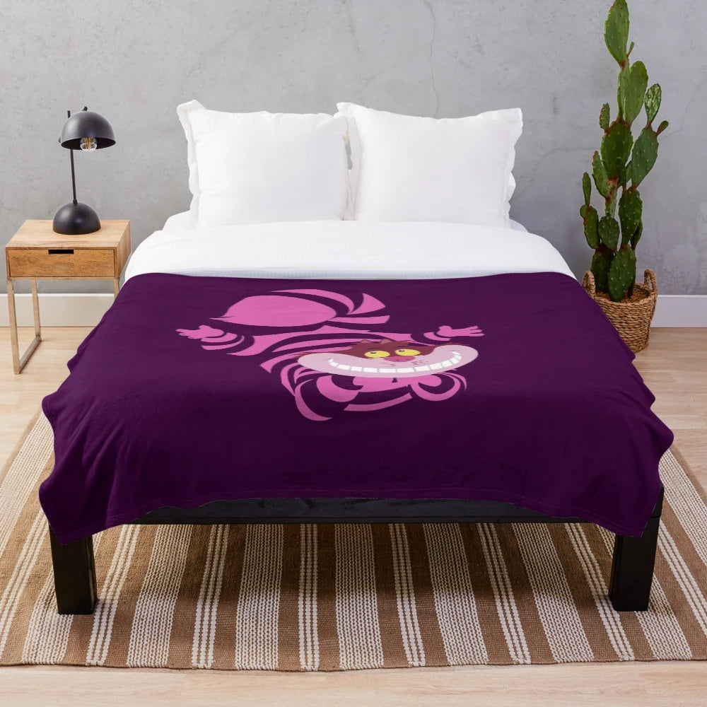 Cheshire the cat plush blanket featuring a whimsical, cartoon-style design
