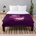 Cheshire the cat plush blanket featuring a whimsical, cartoon-style design