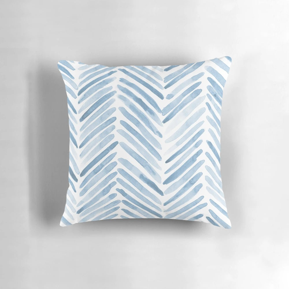 Soft, cozy baby blue watercolor herringbone pattern pillow for modern, scandinavian-inspired home decor.