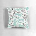 Vibrant cheetah print pillow with a modern black and mint color palette, perfect for adding a touch of safari-inspired style to your home.