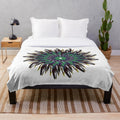 Plush designer-inspired blanket with vibrant pattern