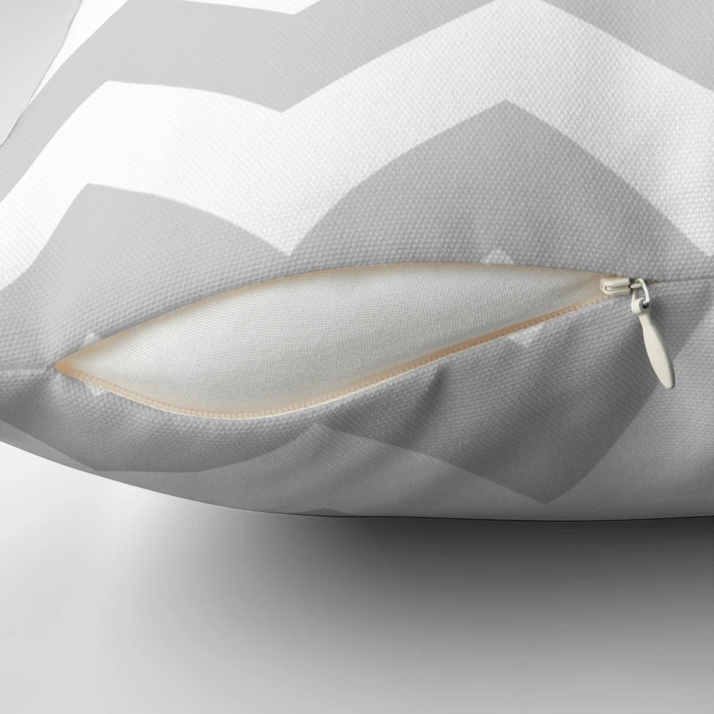 Grey and white chevron striped pillow for contemporary living room or bedroom