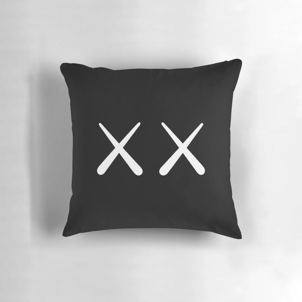 White logo Pillow featuring KAWS designs