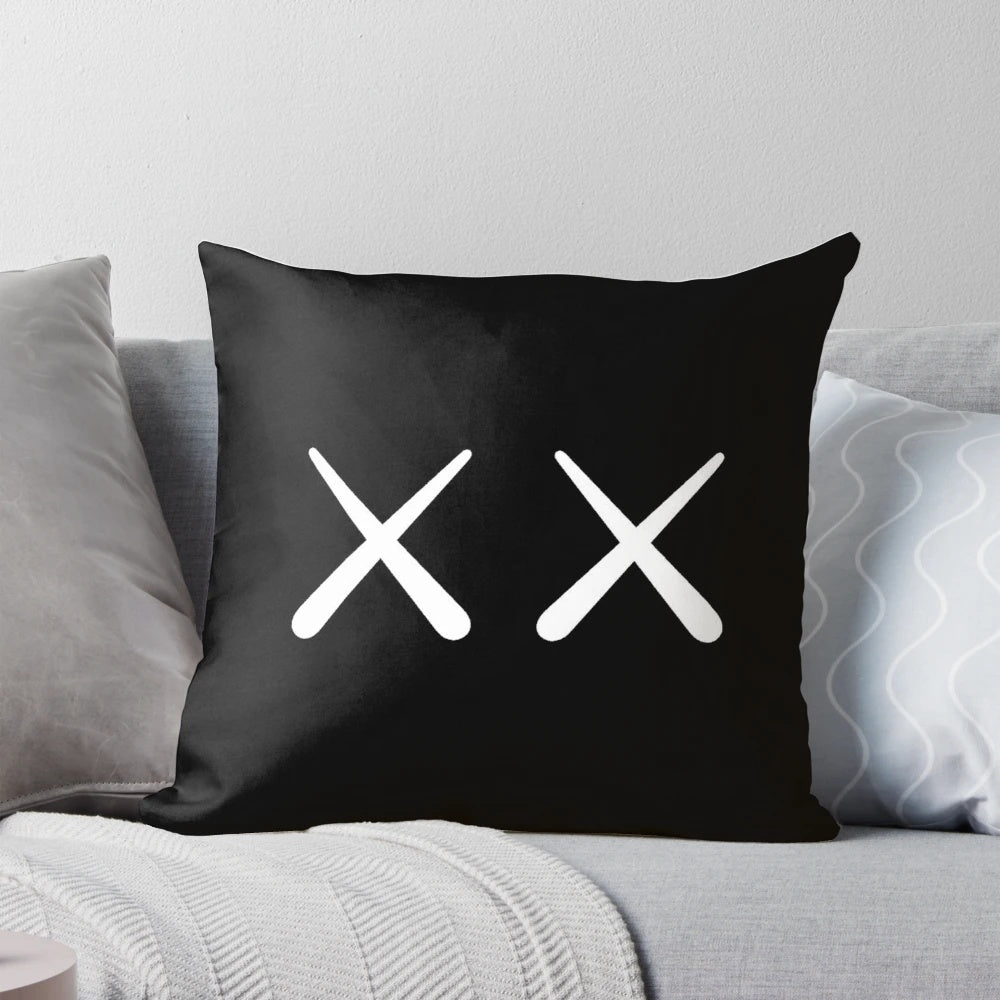 White logo Pillow featuring KAWS designs