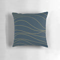 A modern, minimalist pillow in a sophisticated navy blue and mustard yellow pattern.