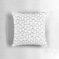 Decorative black and white pillow with a charming otter pattern design