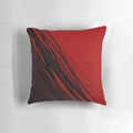 A stylish red and black patterned throw pillow, perfect for adding a touch of modern flair to any room.