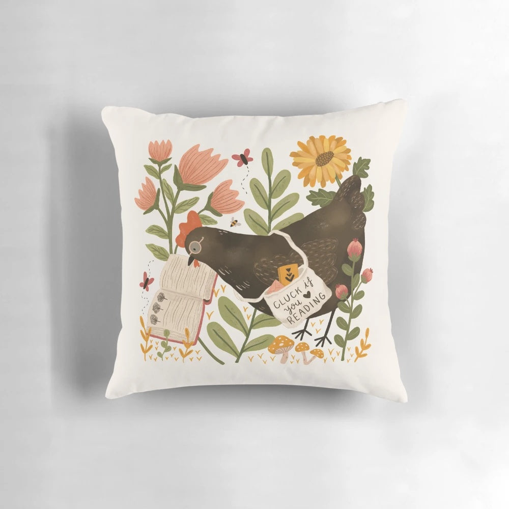A cozy and whimsical chicken-themed pillow with a book design, perfect for book lovers and animal enthusiasts.