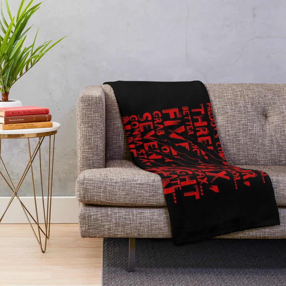 Chibi horror movie characters on a cozy plush blanket