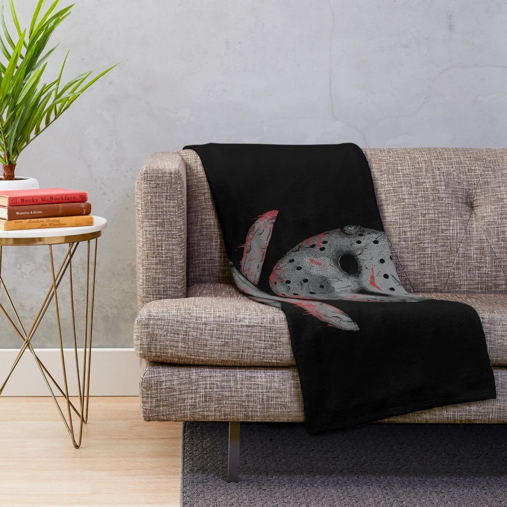 Friday the 13th inspired plush blanket with horror movie graphics
