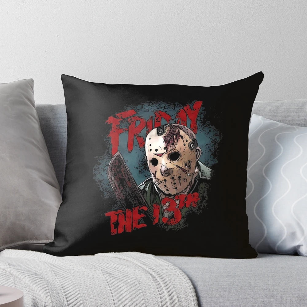 A black and white Friday the 13th t-shirt pillow featuring Jason Voorhees, the iconic horror movie villain.