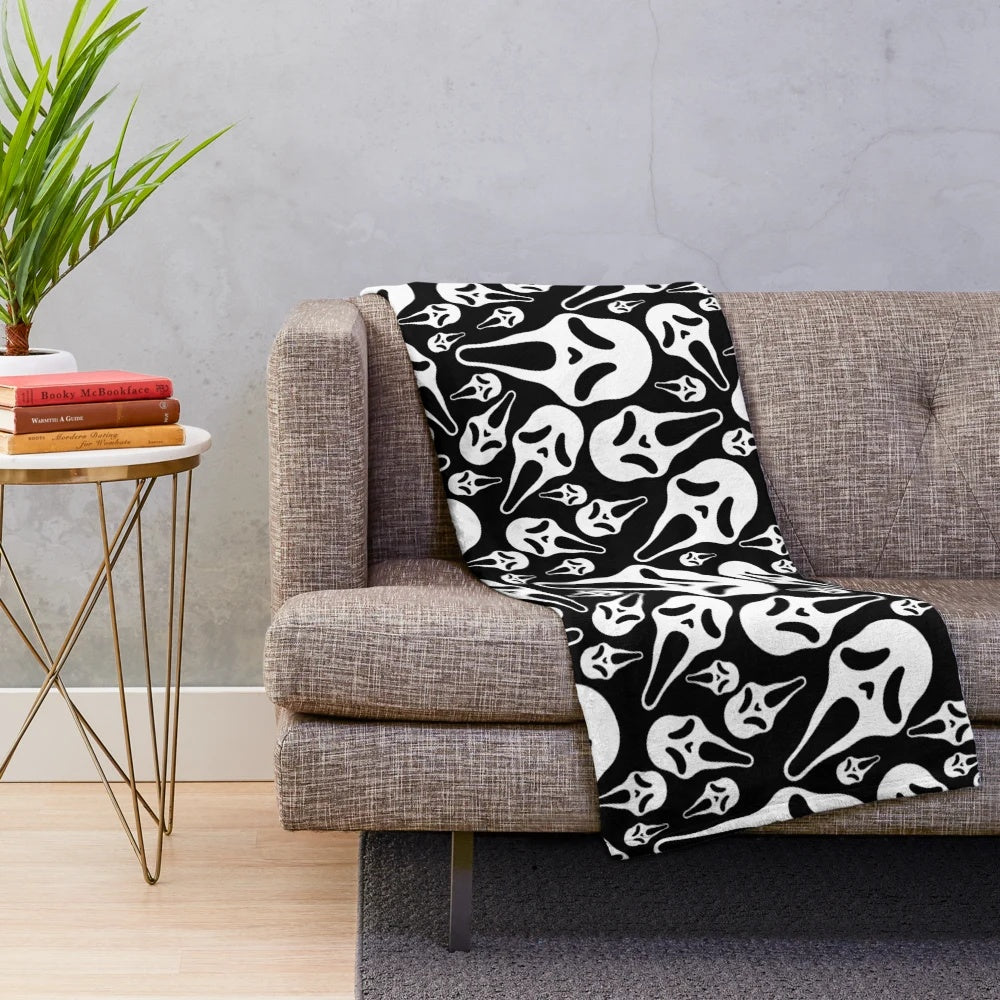 Ghostface plush blanket with spooky horror design