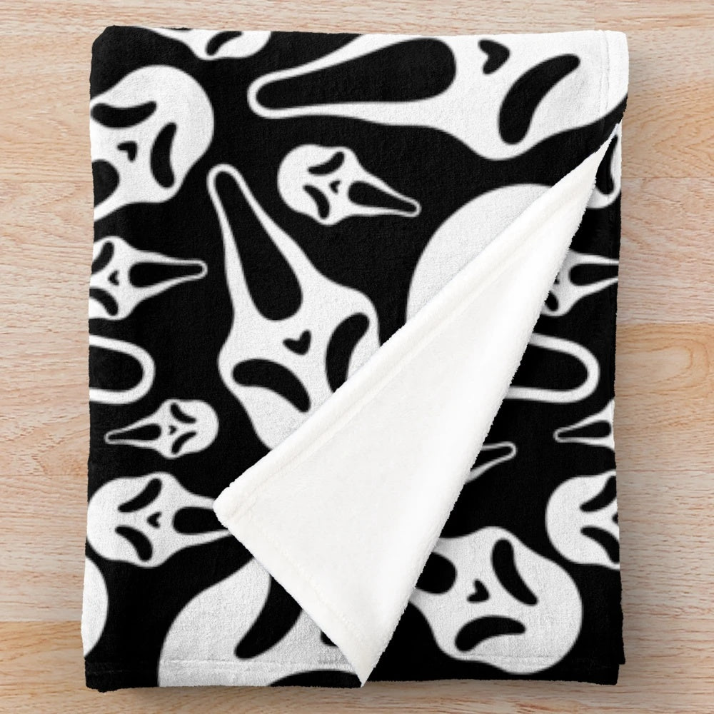 Ghostface plush blanket with spooky horror design