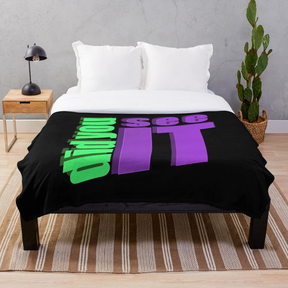 Paranormal-themed plush blanket with ghost and haunting imagery