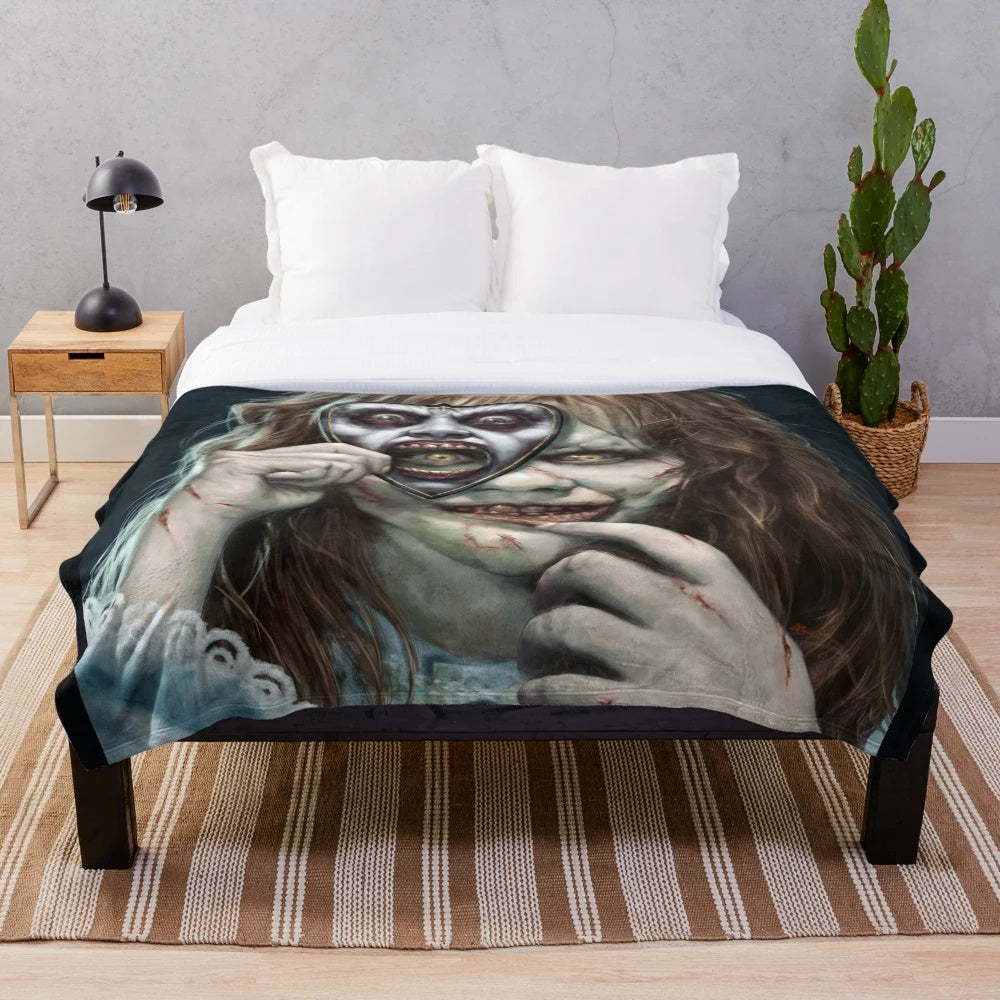 Plush blanket with Regan's Game horror movie-inspired design