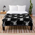 Plush blanket featuring the Bride of Frankenstein and Frankenstein's monster
