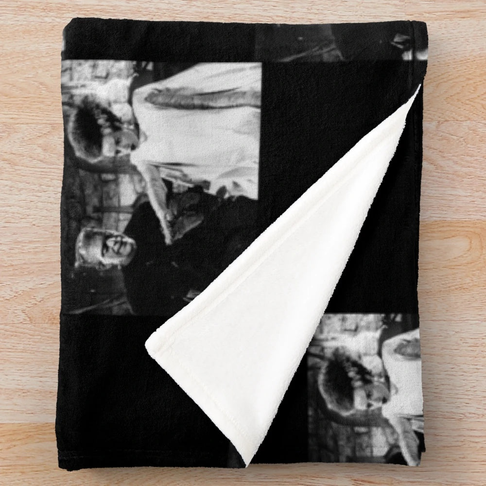 Plush blanket featuring the Bride of Frankenstein and Frankenstein's monster