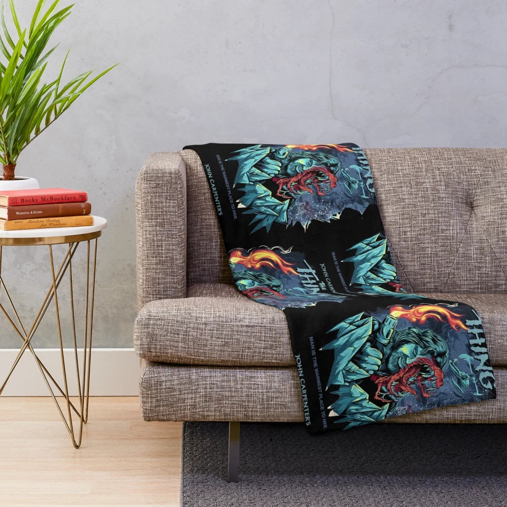 Plush blanket featuring line art of The Thing creature from the 1982 horror movie