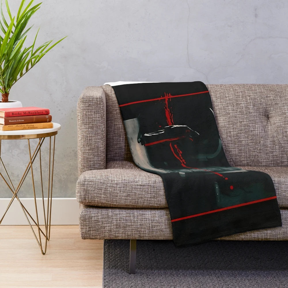Saw movie inspired plush blanket with jigsaw puzzle design