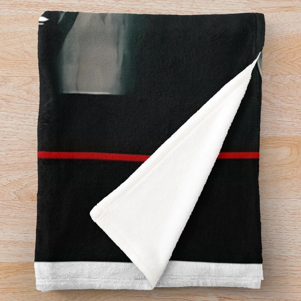 Saw movie inspired plush blanket with jigsaw puzzle design