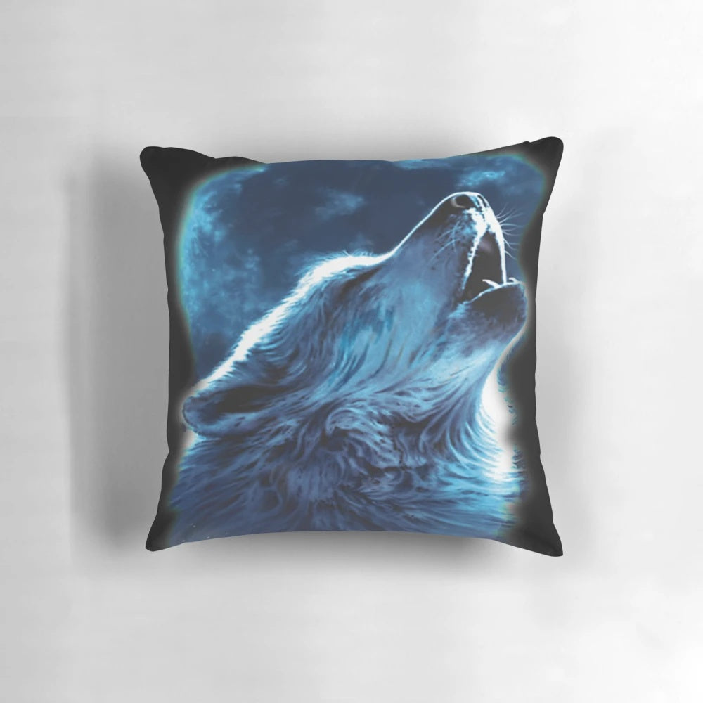 Pillow featuring a photo of a wolf howling against a night sky
