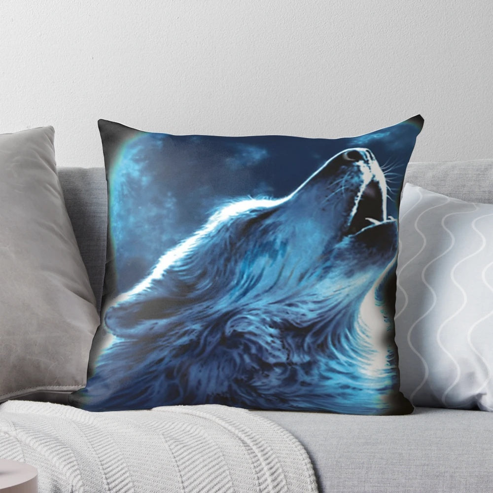 Pillow featuring a photo of a wolf howling against a night sky