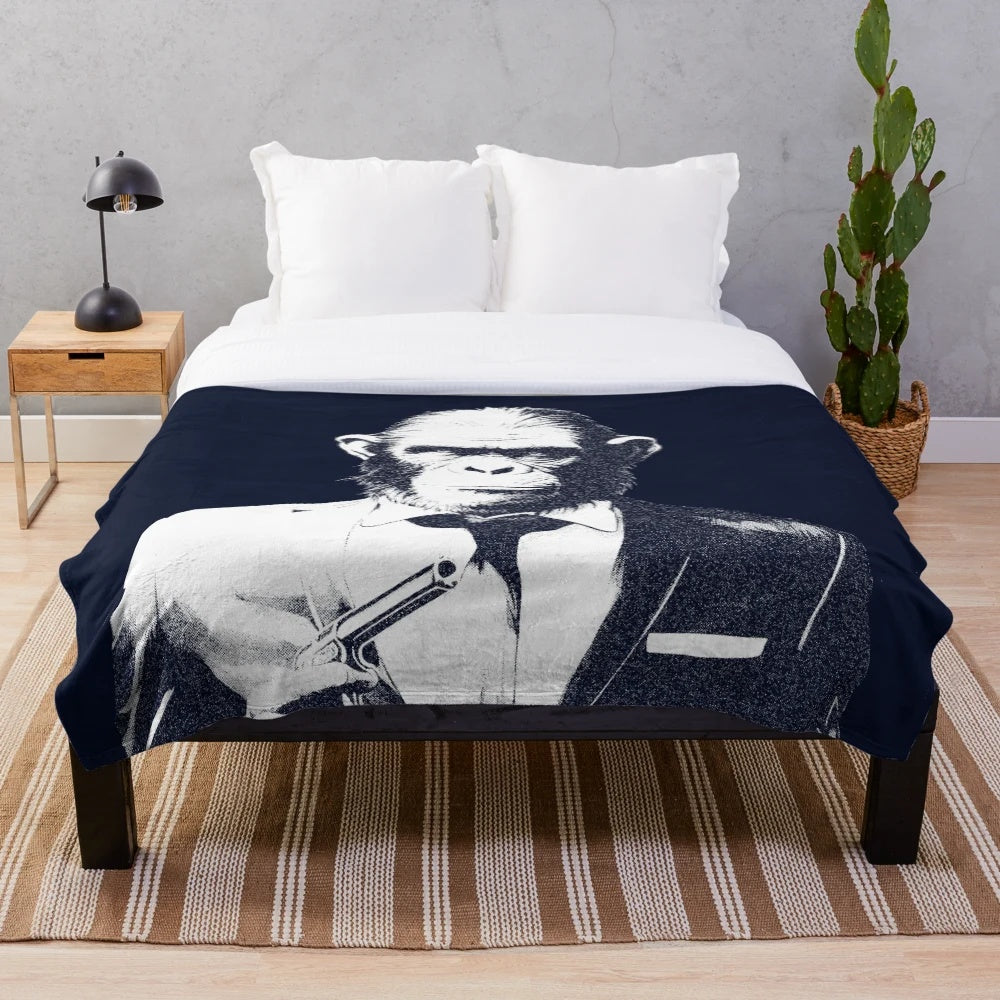 Cozy chimpanzee plush blanket with spy theme