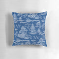 Chinoiserie-style blue and white decorative pillow with pagoda, crane, and boat motif