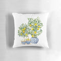 A Chinoiserie-inspired decorative pillow featuring a lemon tree pattern in shades of blue and white.