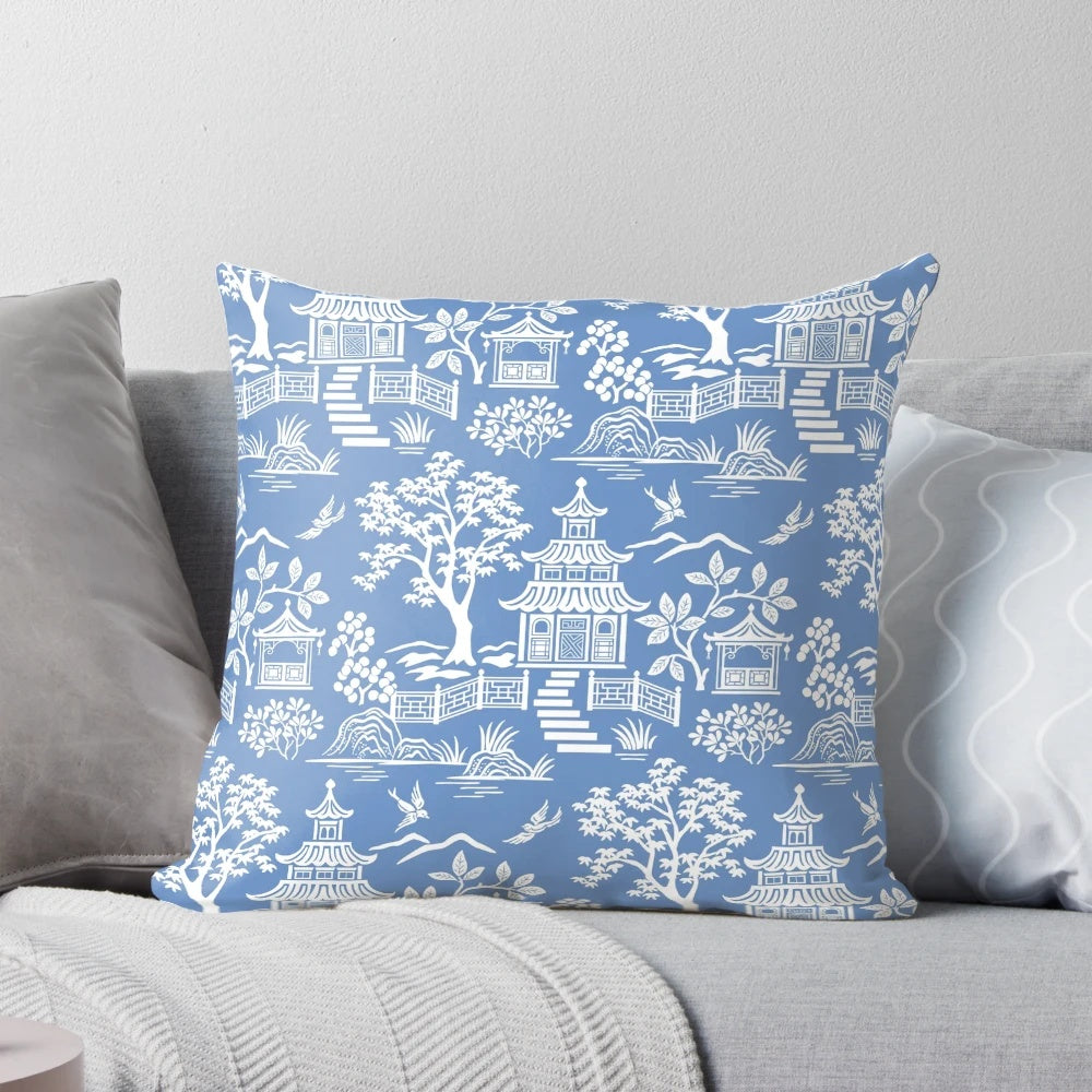 Chinoiserie pagoda pillow with blue and white Asian landscape design