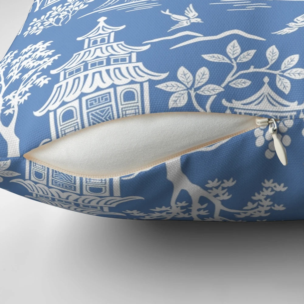 Chinoiserie pagoda pillow with blue and white Asian landscape design