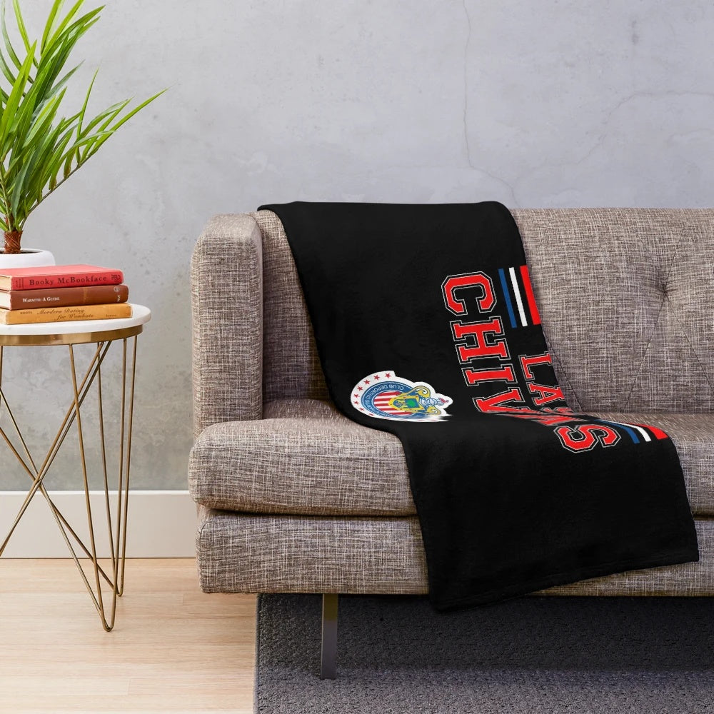 Chivas de Guadalajara plush blanket featuring the team's logo and colors