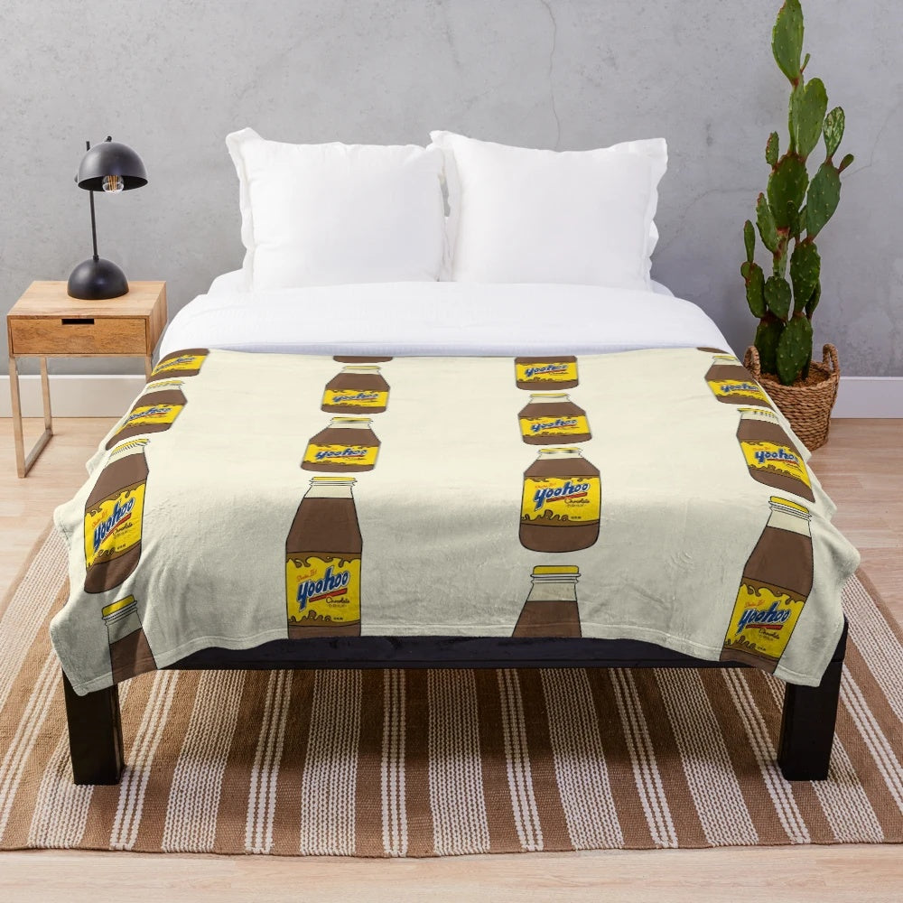 Chocolate drink themed plush blanket with Yoo-hoo inspired design and drink illustration