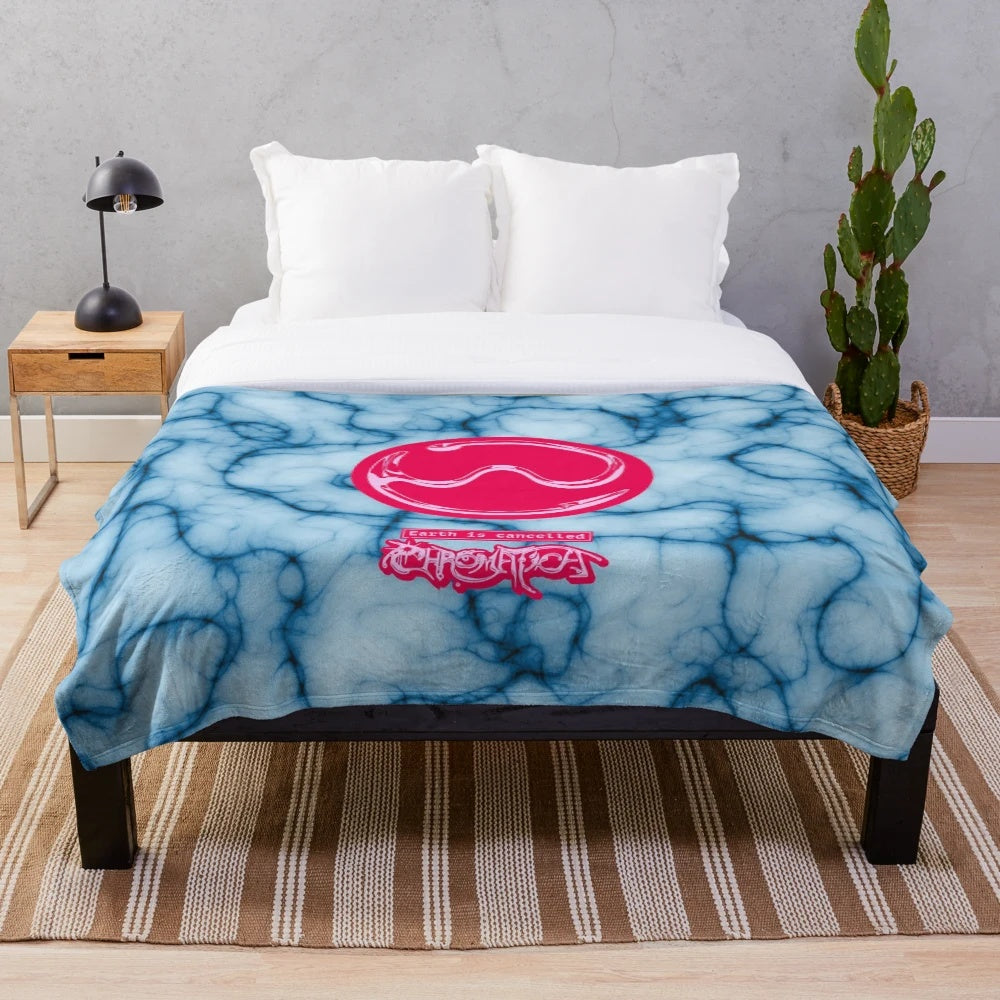 Chromatica-inspired plush blanket with a tie-dye graphic design featuring the Chromatica logo