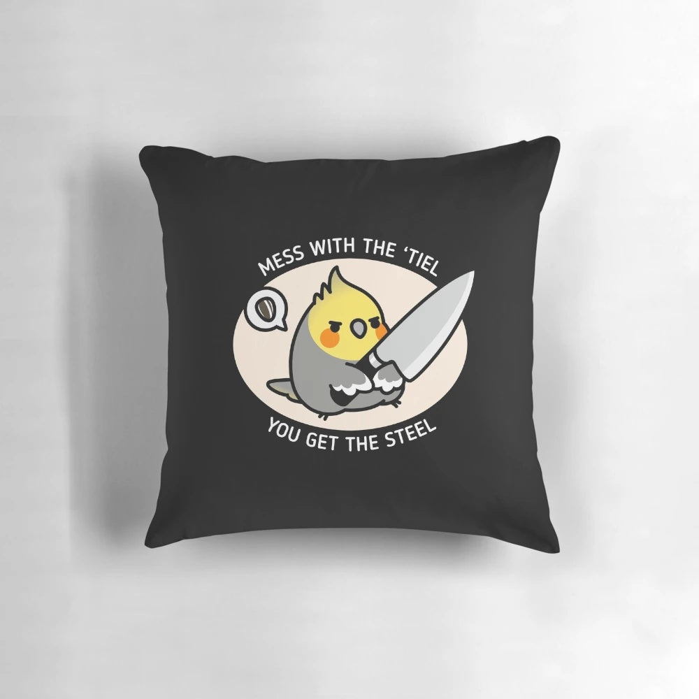 A colorful pillow with an illustration of a chubby cockatiel holding a knife, a humorous bird meme design.