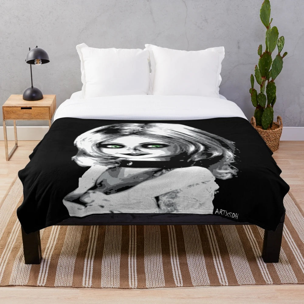 Bride of Chucky-inspired plush blanket with Chucky and Tiffany graphic