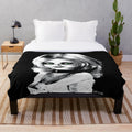 Bride of Chucky-inspired plush blanket with Chucky and Tiffany graphic