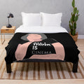 Cozy cinema-themed plush blanket with retro movie graphics