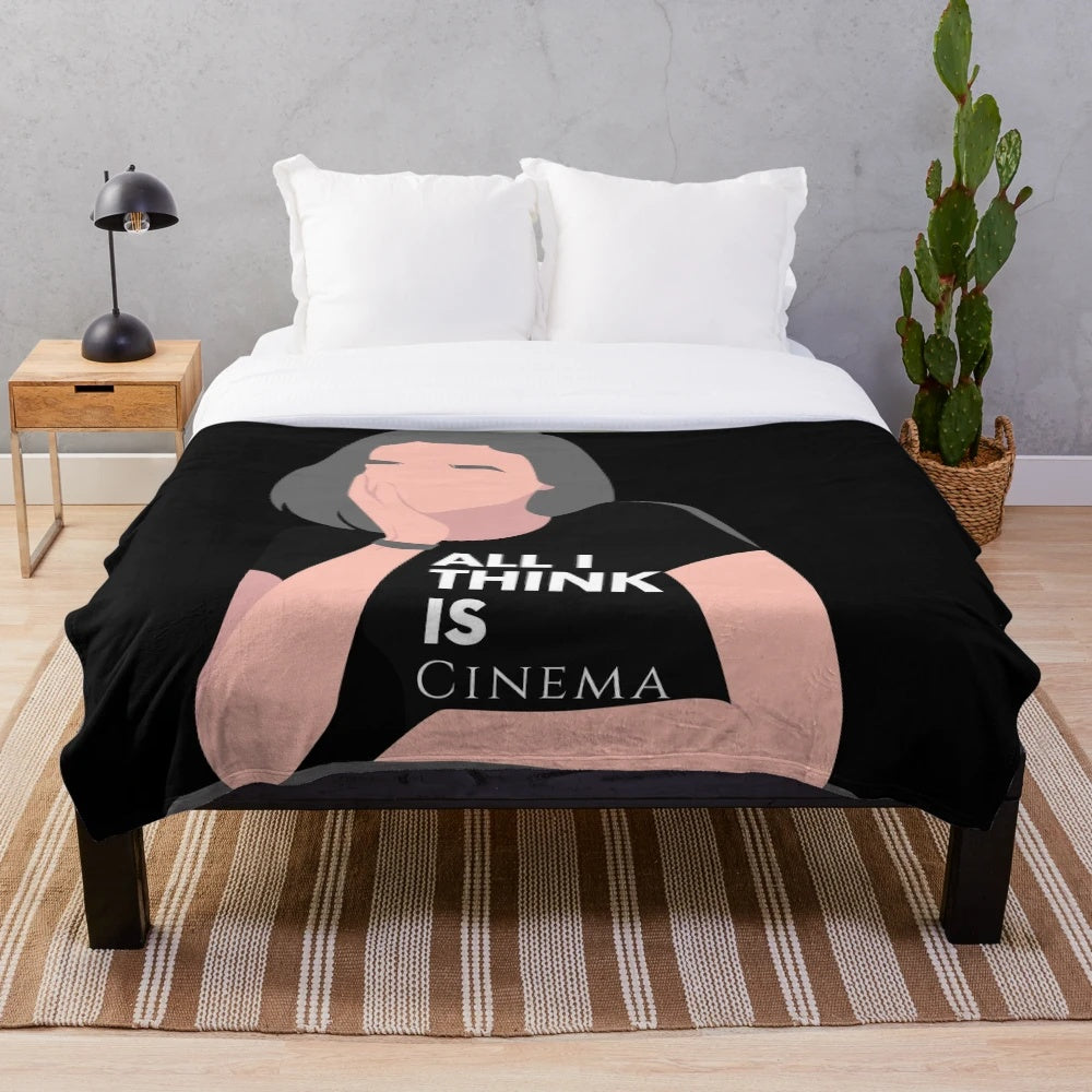 Cozy cinema-themed plush blanket with retro movie graphics