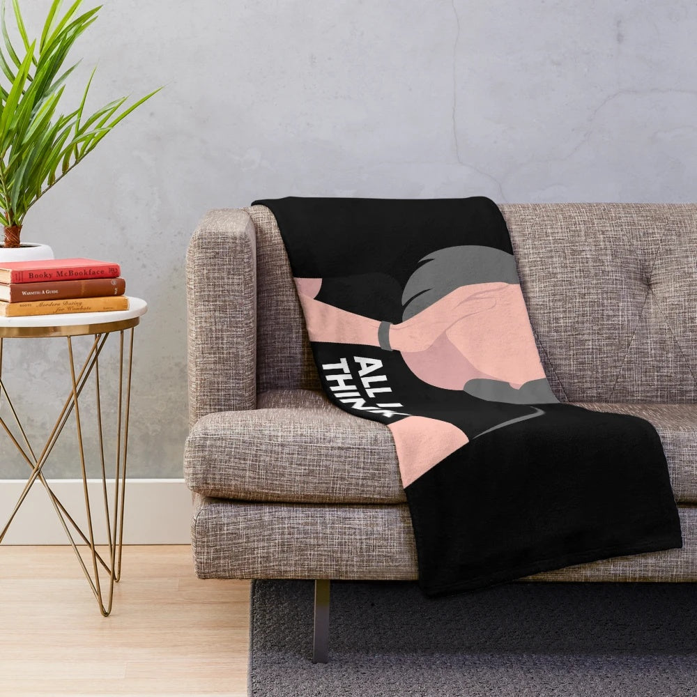 Cozy cinema-themed plush blanket with retro movie graphics