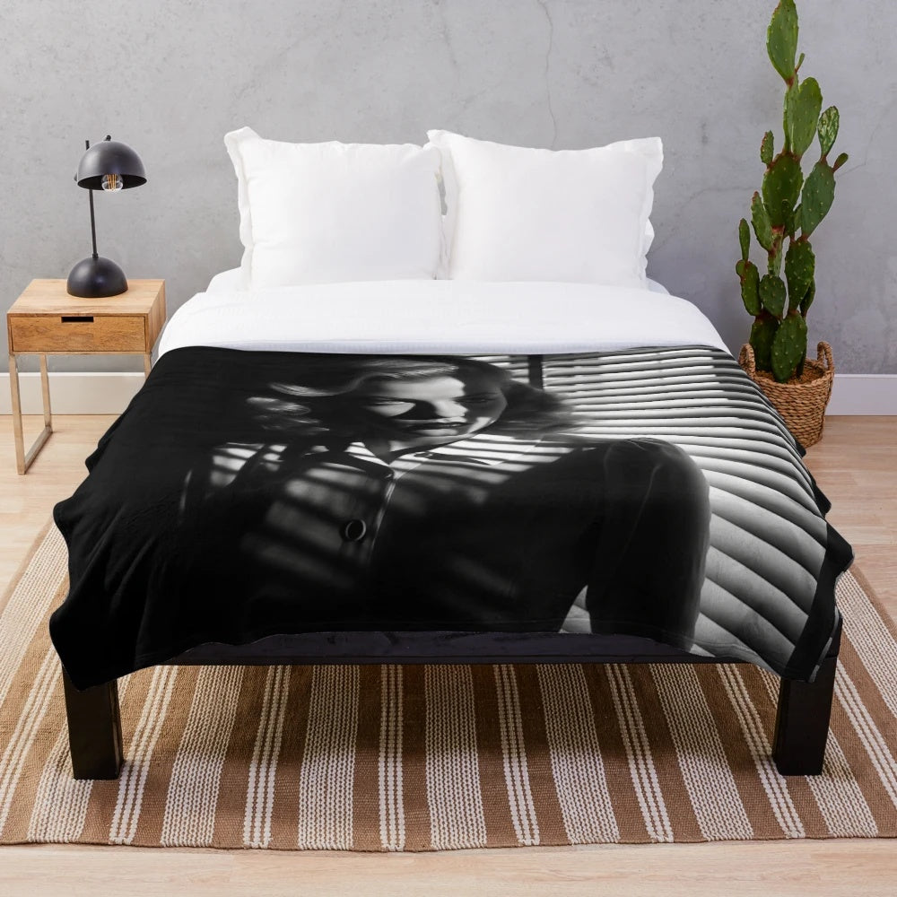 Noir-inspired plush blanket with dramatic chiaroscuro lighting and vintage cinematic aesthetic