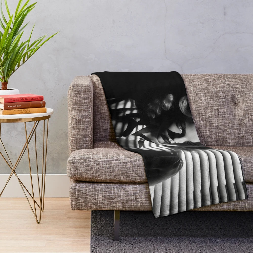 Noir-inspired plush blanket with dramatic chiaroscuro lighting and vintage cinematic aesthetic