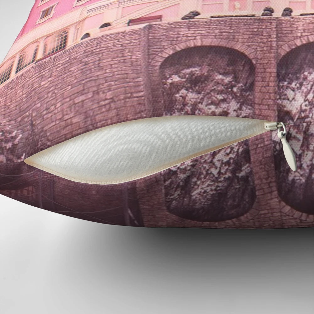 Decorative pillow featuring iconic scenes and characters from The Grand Budapest Hotel movie.