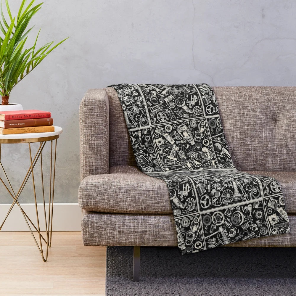 Cozy plush blanket featuring camera and film-inspired design