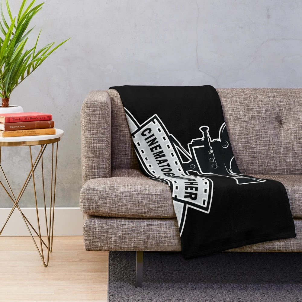 Cinematography-inspired plush blanket with vintage movie graphics