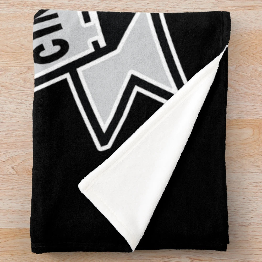 Cinematography-inspired plush blanket with vintage movie graphics