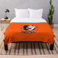 Circus-themed plush blanket with clown-inspired design