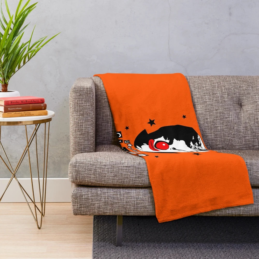 Circus-themed plush blanket with clown-inspired design