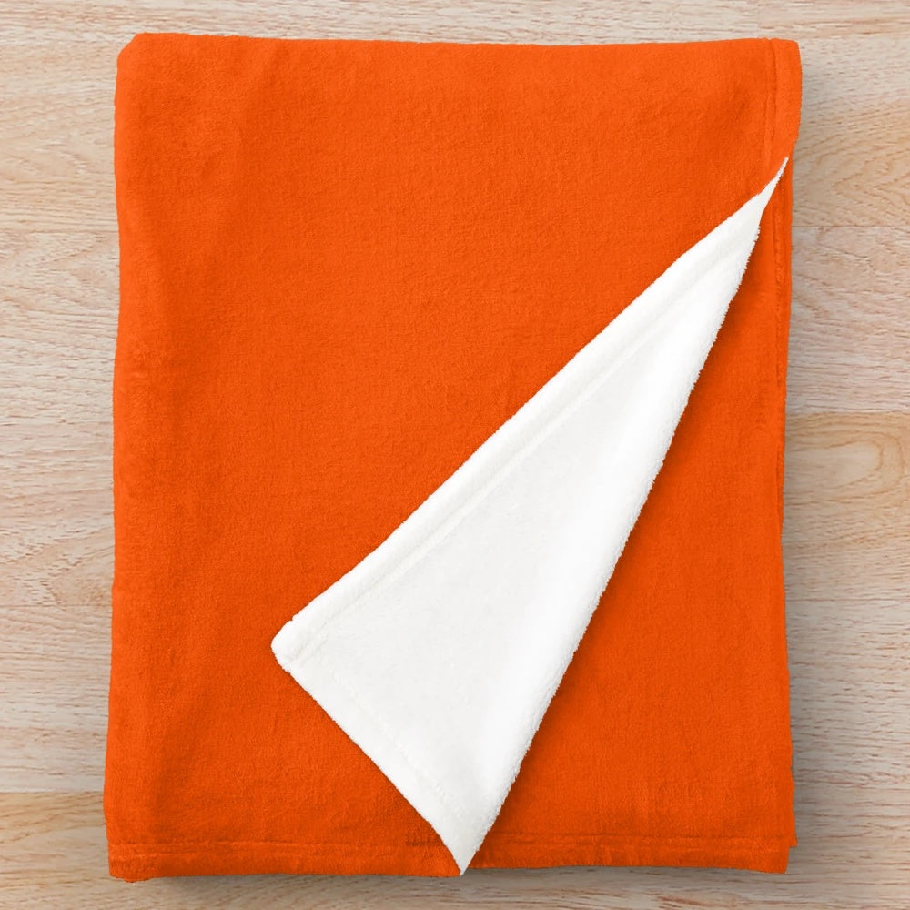 Circus-themed plush blanket with clown-inspired design