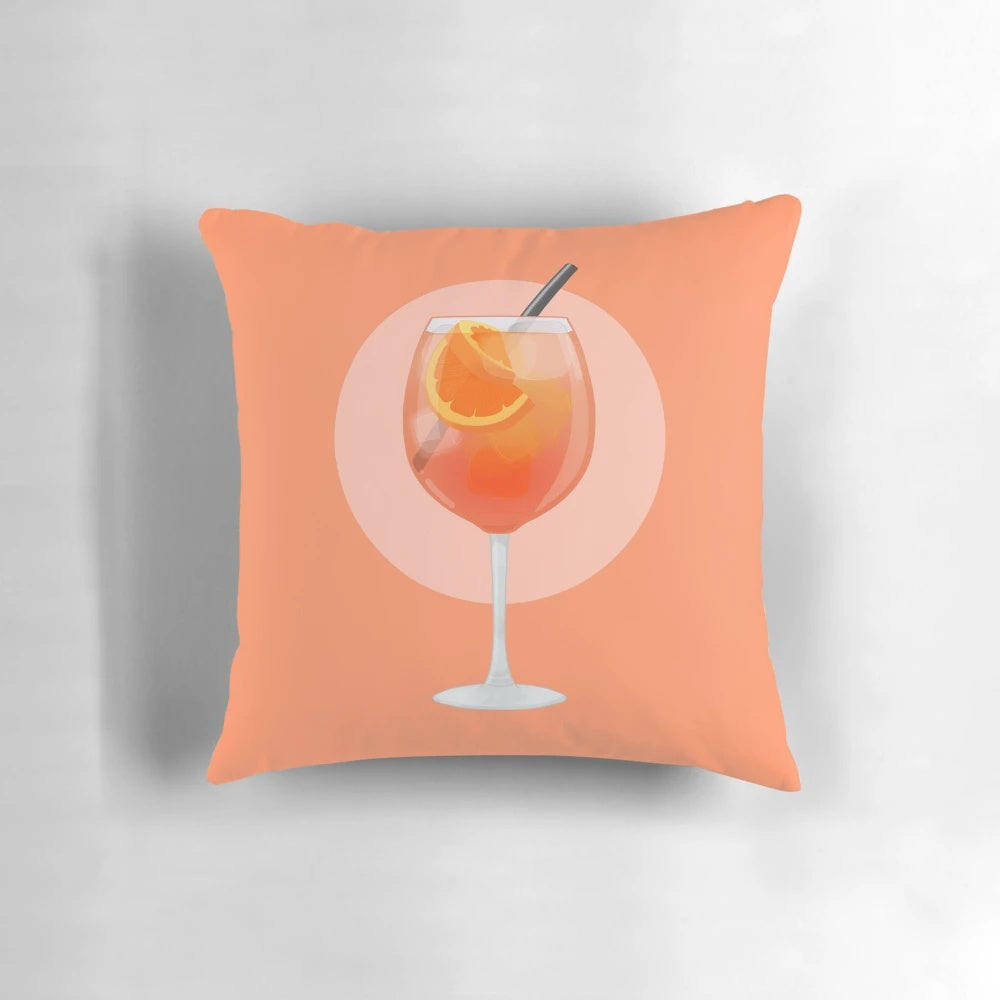 Colorful Aperol Spritz inspired pillow with orange and citrus design